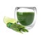 Fresh wheat grass juice in glass, slice of lime and sprouts