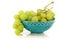 Fresh white grapes in a decorated turquoise bowl