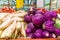 Fresh white radishes and red cabbage on the counter of a vegetable store. Fresh harvest, ripe and healthy vegetables