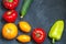 Fresh whole vegetables from new harvest on dark blue background with copy space. Top view. Close-up.