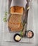 Fresh wholegrain bread on white wooden kitchen table