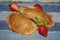Fresh wholemeal and healthy sweet empanadas stuffed with gold-colored strawberry jam gourmet food