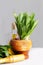 Fresh wild onion leaves in mortar and pestle