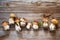 Fresh wild porcini mushrooms and a slug crawling on a mushroom on a wooden old board, top view