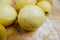 Fresh yellow guavas isolated on a wooden table