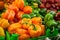 Fresh Yellow, orange, greeen and red peppers at the market