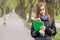 Fresh young student girl in the park.