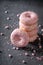 Fresh and yummy pink donuts as popular snack