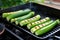 fresh zucchinis ready for grilling on a kitchen counter