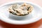 Freshly baked appetizing turkish tortillas - gozleme on a white plate. Shallow depth of field. Handmade Turkish pastries