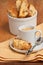 Freshly baked apricot walnut biscotti and cup of espresso