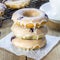 Freshly baked baked doughnuts with blueberries and lemon glaze, for breakfast, square