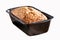 Freshly baked banana bread in tin loaf pan