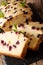 Freshly baked black currant cake with mint close-up. vertical