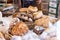 Freshly baked bread and bakery products on the counter.