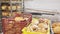 Freshly baked bread, loaves and rolls on tray rack trolley in bakery workshop