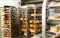 Freshly baked bread on trolley in bakery