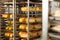 Freshly baked bread on trolley in bakery