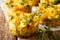 Freshly baked broccoli muffins with cheese and thyme close-up on