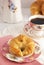 A Freshly Baked Buttery Croissant Laid on the Table for Breakfast with Hot Black Coffee