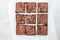 Freshly baked chocolate chewy brownie, cut into nine square pieces