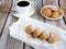 Freshly baked cookies with cinnamon, coffee. Sweet lunch.