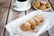 Freshly baked cookies with cinnamon, coffee. Sweet lunch.