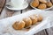 Freshly baked cookies with cinnamon, coffee. Sweet lunch.