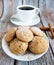 Freshly baked cookies with cinnamon, coffee. Sweet lunch.