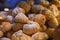 Freshly baked cream puff, pastry with custard. Cakes on the counter in a cafe