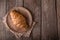 Freshly baked croissants on wooden boards, with wheat eart.