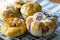 Freshly Baked danish pastry on wooden background, assorted bread and pastry, Different kinds of bread rolls.