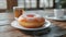 Freshly baked donut on wooden table, a sweet indulgence