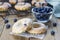 Freshly baked doughnuts with blueberries and lemon glaze, for breakfast