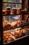 freshly baked goods in a small bakery showcase