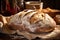 Freshly baked handmade sourdough bread with golden crust top view, bakery concept. Baker shop