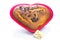 Freshly baked heart-shaped Valentines cake