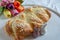 Freshly baked Home made sweet braided bread on a wooden board