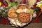 Freshly baked homemade bread arranged in traditional Bulgarian textiles. Image of some tasty Home-made bakery products.