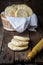 Freshly baked Moroccan mini flatbread - batbouts on wooden table. Selective focus. Arabian food