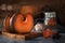 Freshly baked pieces of pumpkin stand against the background of kitchen utensils and a basket with eggs.