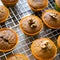 Freshly baked pumpkin muffins with walnuts, cinnamon and nutmeg