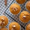 Freshly baked pumpkin muffins with walnuts, cinnamon and nutmeg