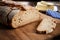 Freshly baked sliced loaf of rye bread in closeup