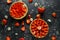 Freshly baked Strawberry custard tarts on wooden tray with camomiles, summer theme