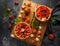 Freshly baked Strawberry custard tarts on wooden tray with camomiles, summer theme