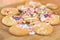 Freshly baked sugar cookies with white icing closeup