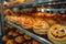 Freshly Baked Sweet Pastries Displayed in a Bakery Shelf Closeup with Selective Focus