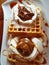 Freshly baked waffles with creamy dulce de leche