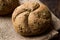 Freshly Baked Whole Wheat Grain Kaiser Roll Round Breads with Sack.